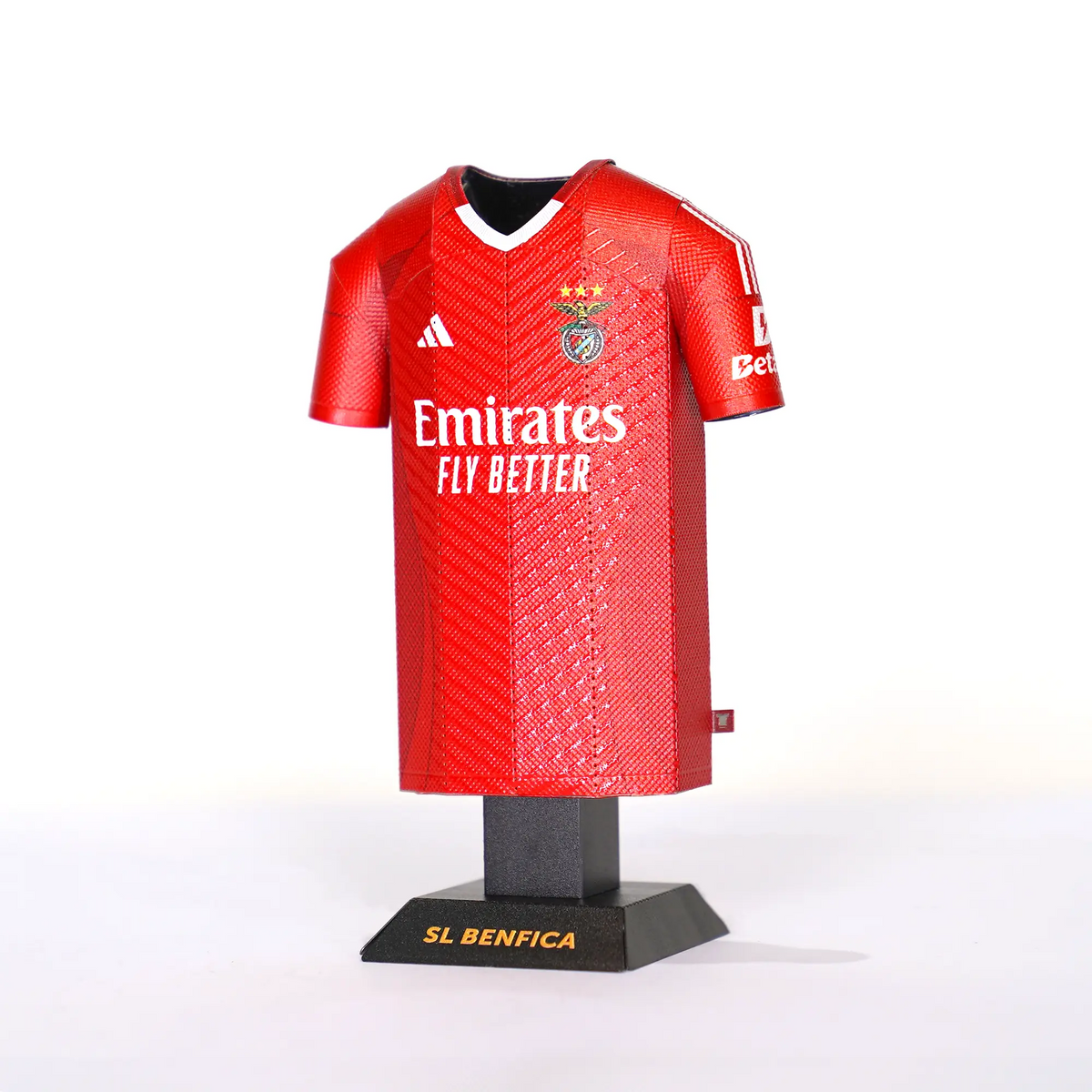 Red sports jersey with branding on a white background