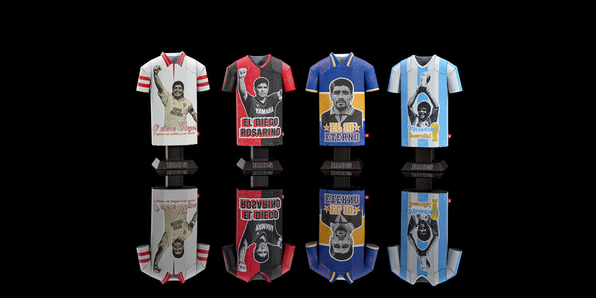 Set of miniature sports jerseys with player graphics on a black background