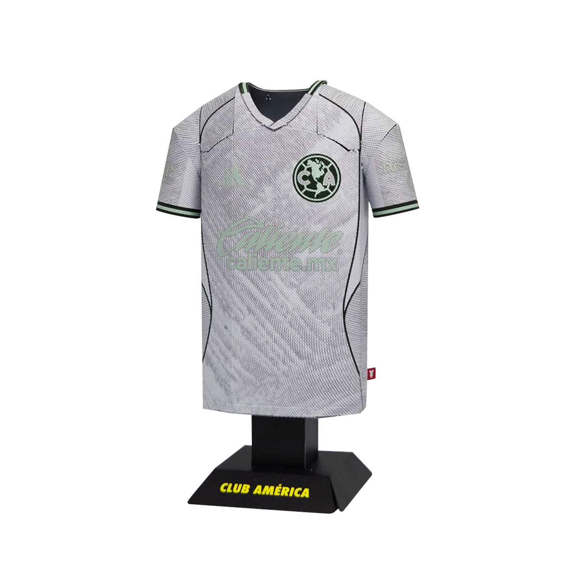 Gray soccer jersey on a black stand with Club America branding