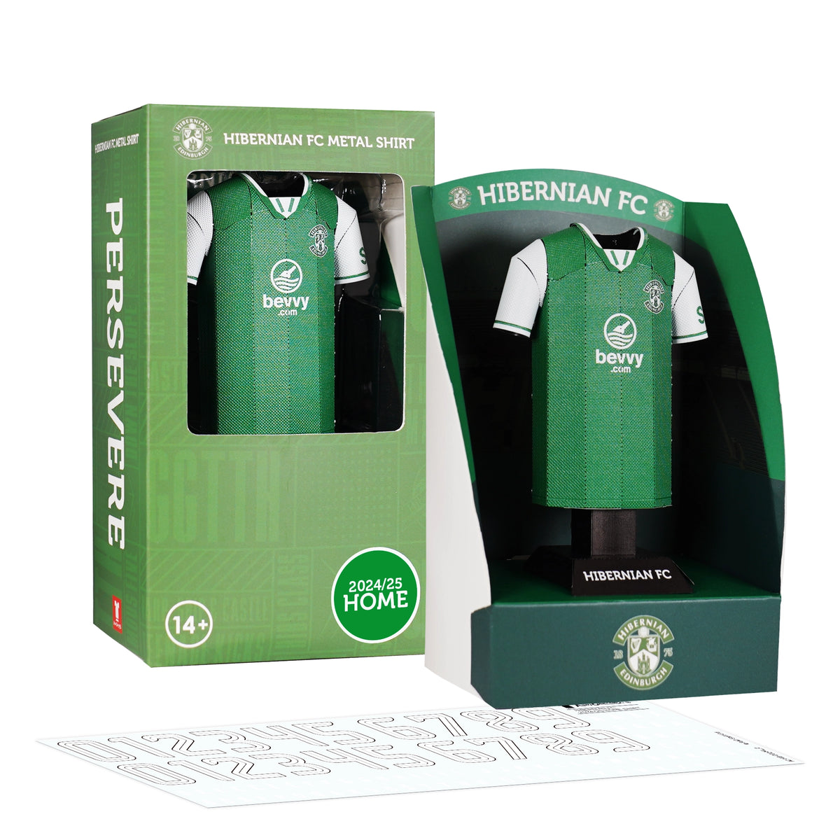 A product set display showing the 3D metal Hibernian FC 2024/2025 home jersey collectible alongside its custom display box and typography decal sheet.