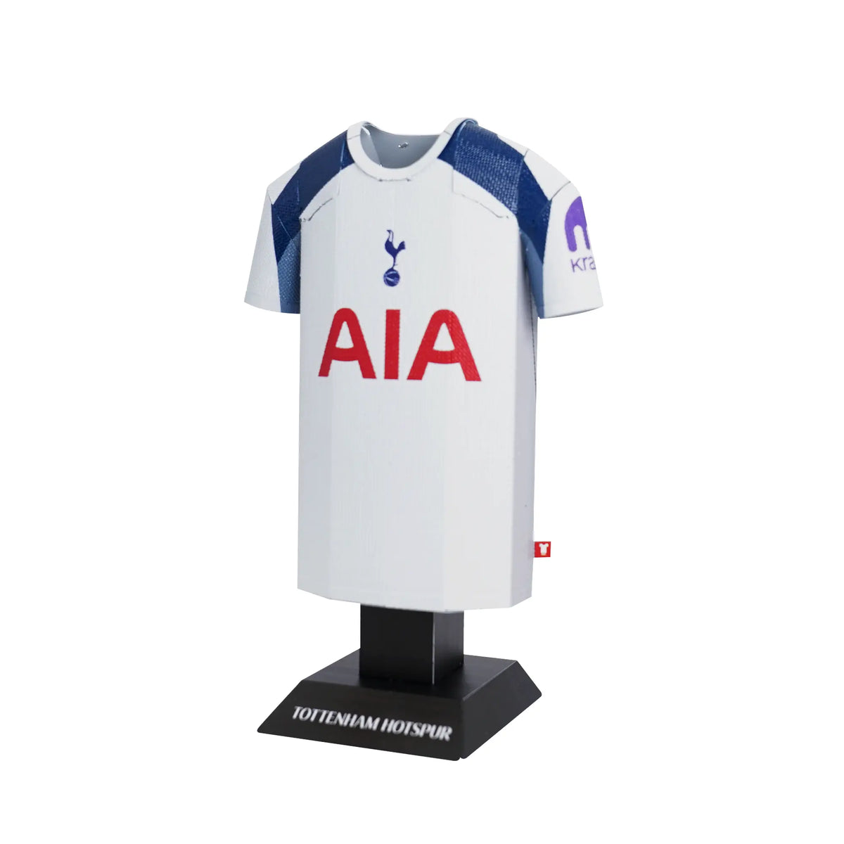 White sports jersey with blue sleeves and red 'AIA' logo on a black stand with 'Tottenham Hotspur' branding.